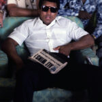 Muhammad Ali Instagram - Muhammad Ali during an interview with the press after winning his fight vs Joe Frazier at Hilton Hotel. Ali is holding a newspaper with a headline that says “ALI WINS.”⁣ ⁣ Manila, Philippines – October 1975.⁣ ⁣ 📸: @neilleiferphotography⁣ ⁣ ⁣ #MuhammadAli #Icon #ThrillainManila #MuhammadAlivsJoeFrazier #Boxing #Legendary #GOAT #Champion