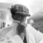 Muhammad Ali Instagram – A portrait of Muhammad Ali wearing a hat in the dressing room before his fight vs Joe Bugner at Caesars Palace Hotel. ⁣
⁣
Las Vegas, NV.⁣
February 1973. ⁣
⁣
📸: @neilleiferphotography⁣
⁣
 ⁣
⁣
#MuhammadAli #Icon #Star #Boxing #LasVegas #JoeBugner #CaesarsPalaceHotel #NeilLeifer #Photography
