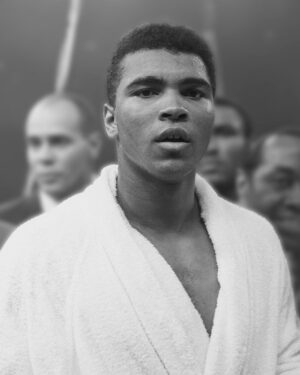 Muhammad Ali Instagram - At the Freedom Hall in Louisville, on October 29, 1960, Ali embarked on his first professional boxing match, squaring off against Tunney Hunsaker. Muhammad emerged victorious.⁣
⁣
 ⁣
#MuhammadAli #Icon #Boxing #Champion #Match #Professional #TunneyHunsaker #Victory