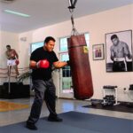 Muhammad Ali Instagram - Portrait of Muhammad Ali during a photo shoot in the gym at his farm on Kephart Road.⁣ ⁣ 📸: @neilleiferphotography⁣ ⁣ ⁣ #MuhammadAli #Icon #Boxing #PhotoShoot #Portrait #NeilLeifer #KephartRoad