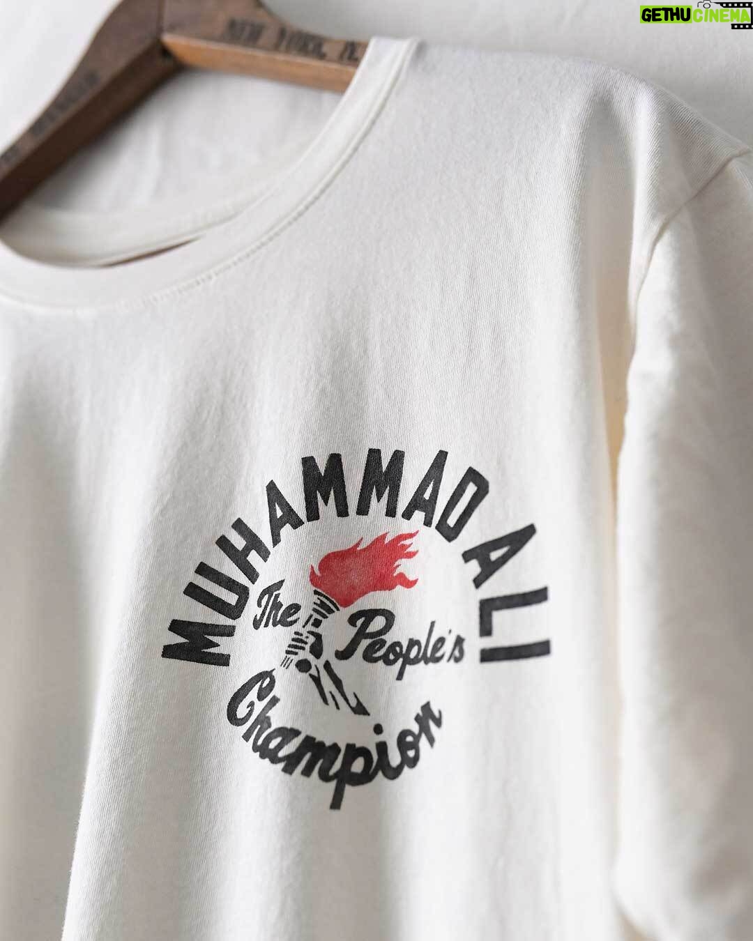 Muhammad Ali Instagram - "Impossible is potential. Impossible is temporary. Impossible is nothing.” – Muhammad Ali They said he couldn’t win. They said Muhammad Ali was going to get hurt. They said he was past his prime. Overrated. Out of his league. They said Foreman was too strong. Too big. That he was invincible. They fretted and worried. Ali heard it all as music and did what he always did — he danced. Then he came off the ropes and struck. Impossible? In Zaire Ali blew up that word forever. The “Rumble in the Jungle” stands as boxing’s great work of art. And Ali — the greatest that ever was — rendered the world speechless. @rootsoffight is throwing back to the greatest boxing event in history with this new “Rumble in the Jungle" tee! Shop link in story! #MuhammadAli #RootsofFight #KnowYourRoots #GOAT