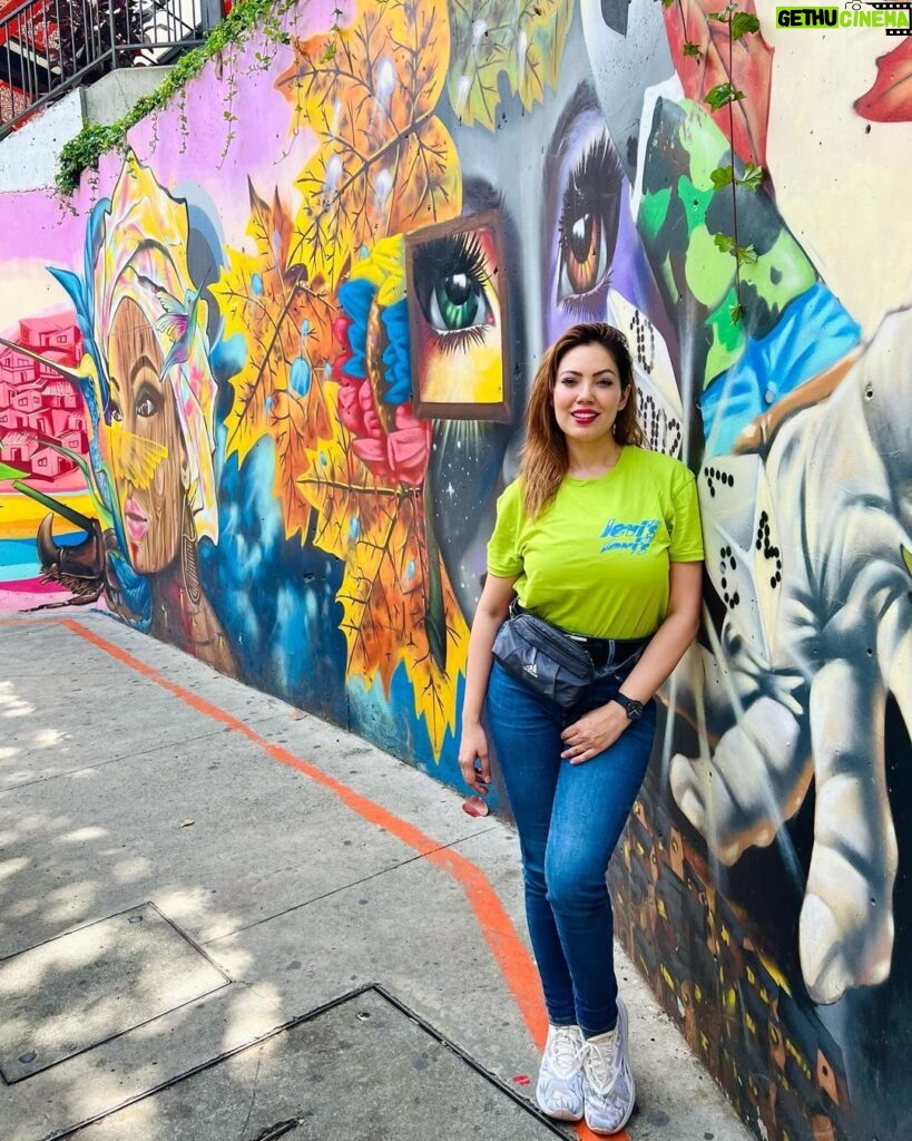 Munmun Dutta Instagram - Throughout the 80s and 90s, 𝐂𝐨𝐦𝐮𝐧𝐚 𝟏𝟑 was considered to be one of the most dangerous neighborhoods in the world. It was run by violent drug trafficking organizations, who used the poor, sprawling hillside barrio as a transit route in and out of the city, and served as a stronghold for guerrillas, gangs, and paramilitaries. During operation ORION in 2002 by the then president , the neighborhood’s residents were caught in the crossfires resulting in many injuries and death. In 2011, the government installed a series of outdoor escalators that connected parts of the once chaotic and isolated hillside neighborhood to the city below. Local artists came out to brighten up their neighborhood. The result was the creation of one of the most colorful communes in Medellín filled with murals and graffitis. Many murals tell the story of 𝐂𝐨𝐦𝐮𝐧𝐚 𝟏𝟑 , about operation ORION and their violent and sad past and also depicts a hopeful future ❤️🇨🇴 It still is a poor and not entirely safe neighborhood but the future looks brighter for what was once one of the most dangerous neighborhoods in the world. 🫶🏻 #munmundutta #mytravelstory #comuna13 #comuna13demedellín #comuna13graffititour #colombia #medellin #history #streetart #solotravel #mytraveldiary Comuna 13, Medellín, Colombia