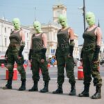 Nadezhda Tolokonnikova Instagram - Pussy Riot - ПОЛЗАНИЕ (акция). В ходе акции участницы Pussy Riot в военной форме ползали по ключевым локациям Москвы, напоминая гражданам о том, что никому во время войны отсидеться или отмолчаться не удастся. Война, начатая Путиным, должна быть закончена вместе с его режимом. Искусство имитирует жизнь или наоборот? Pussy Riot - CRAWLING (action). During the action, Pussy Riot members in military uniforms crawled around the key locations of Moscow, reminding citizens that no one will be able to sit out or remain silent during the war. The war started by Putin must be ended - with his regime. Life imitates art or the other way around? Photos by @evgenyfeldman @ifeelpresent