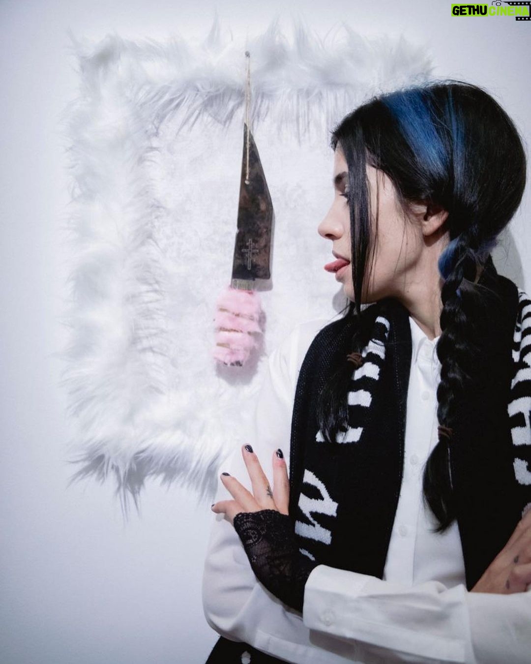 Nadezhda Tolokonnikova Instagram - "This Knife K•lls The Patriarchy" at @christiesinc 💒🥷 100% go to @unicef 🖤 Current bid: $3200 Bidding is live for the next 4 days. Curator: @arushikapoor1 16 x 20 inches canvas, faux fur, steel, wood "This Knife K•lls The Patriarchy" is a genesis piece of "De•th by 1000 Cuts" project. The artist uses repurposed metal foraged from an abandoned prison. In the production of these works, the artist uses her skills that she learned while being subjected to forced labor during the 2 years she served as a political prisoner in Russian labor camps. De•th by 1000 cuts refers to an ancient method of tort•re in which numerous small cuts were made on a victim's body. None of the cuts were deadly by themselves, but the combination of them would cause them to die a slow, painful de•th. Similarly, every activist who raise a voice against an oppressive authoritarian system, causes it to ble•d and to, eventually, 🪦. The artist who was thrown in prison for her art and has to bear her criminal record for the rest of her life, is reclaiming the identity of a criminal, wears it as a badge of honor, grabs back her agency and stands up against oppressors. Lucky to be working with @properreplica on this project. Link to the auction in bio 🔪🪦