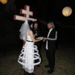 Nadezhda Tolokonnikova Instagram - 💒🔪🫀💍 и умерли в один день x @vegsurfer @nytimes 📝: Nathan Monk, a priest who left the Russian Orthodox Church because he did not support its stance on gay marriage, led a ceremony. Ms. Tolokonnikova’s daughter @gerariot made the party’s playlist, which featured Soviet pop and contemporary Russian trap. For food, Ms. Tolokonnikova suggested serving pickles and vodka, but Mr. Caldwell insisted on something more robust. Ms. Tolokonnikova baked a large vegan Napoleon cake, dyed it black and assembled it in the shape of a cross, a symbol she uses often in her artwork. The dress code was “gopnik,” a word that encapsulates a style of dress, music and art reflecting the working class in the former Soviet states in the 1980s and 1990s. Guests showed up in tracksuits, house slippers, Adidas slides and newsboy caps, and one brought an accordion. Photos: @thecobrasnake Article: @vsaffron Priest: @fathernathan