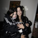 Nadezhda Tolokonnikova Instagram - 💒🔪🫀💍 и умерли в один день x @vegsurfer @nytimes 📝: Nathan Monk, a priest who left the Russian Orthodox Church because he did not support its stance on gay marriage, led a ceremony. Ms. Tolokonnikova’s daughter @gerariot made the party’s playlist, which featured Soviet pop and contemporary Russian trap. For food, Ms. Tolokonnikova suggested serving pickles and vodka, but Mr. Caldwell insisted on something more robust. Ms. Tolokonnikova baked a large vegan Napoleon cake, dyed it black and assembled it in the shape of a cross, a symbol she uses often in her artwork. The dress code was “gopnik,” a word that encapsulates a style of dress, music and art reflecting the working class in the former Soviet states in the 1980s and 1990s. Guests showed up in tracksuits, house slippers, Adidas slides and newsboy caps, and one brought an accordion. Photos: @thecobrasnake Article: @vsaffron Priest: @fathernathan