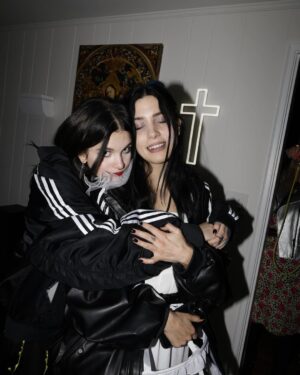 Nadezhda Tolokonnikova Instagram - 💒🔪🫀💍 и умерли в один день x @vegsurfer 

@nytimes 📝: Nathan Monk, a priest who left the Russian Orthodox Church because he did not support its stance on gay marriage, led a ceremony.

Ms. Tolokonnikova’s daughter @gerariot made the party’s playlist, which featured Soviet pop and contemporary Russian trap. For food, Ms. Tolokonnikova suggested serving pickles and vodka, but Mr. Caldwell insisted on something more robust.

Ms. Tolokonnikova baked a large vegan Napoleon cake, dyed it black and assembled it in the shape of a cross, a symbol she uses often in her artwork.

The dress code was “gopnik,” a word that encapsulates a style of dress, music and art reflecting the working class in the former Soviet states in the 1980s and 1990s. 

Guests showed up in tracksuits, house slippers, Adidas slides and newsboy caps, and one brought an accordion. 

Photos: @thecobrasnake 
Article: @vsaffron 
Priest: @fathernathan