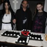 Nadezhda Tolokonnikova Instagram - 💒🔪🫀💍 и умерли в один день x @vegsurfer @nytimes 📝: Nathan Monk, a priest who left the Russian Orthodox Church because he did not support its stance on gay marriage, led a ceremony. Ms. Tolokonnikova’s daughter @gerariot made the party’s playlist, which featured Soviet pop and contemporary Russian trap. For food, Ms. Tolokonnikova suggested serving pickles and vodka, but Mr. Caldwell insisted on something more robust. Ms. Tolokonnikova baked a large vegan Napoleon cake, dyed it black and assembled it in the shape of a cross, a symbol she uses often in her artwork. The dress code was “gopnik,” a word that encapsulates a style of dress, music and art reflecting the working class in the former Soviet states in the 1980s and 1990s. Guests showed up in tracksuits, house slippers, Adidas slides and newsboy caps, and one brought an accordion. Photos: @thecobrasnake Article: @vsaffron Priest: @fathernathan
