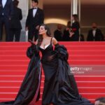 Nadine Njeim Instagram - I have always been fascinated by the glamour of the 50s era. The era of Brigitte Bardot and Sofia Loren.… You know, I love how back then, women embraced their curves, fashion was bold, yet feminine… And here we are today… Zuhair and I decided to create a custom made dress inspired by this golden Era and this magical city… Cannes… Thank you for every person who made this vision come to life… Thank you @chopard for hosting me 🤍🖤