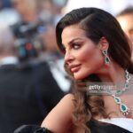 Nadine Njeim Instagram - I have always been fascinated by the glamour of the 50s era. The era of Brigitte Bardot and Sofia Loren.… You know, I love how back then, women embraced their curves, fashion was bold, yet feminine… And here we are today… Zuhair and I decided to create a custom made dress inspired by this golden Era and this magical city… Cannes… Thank you for every person who made this vision come to life… Thank you @chopard for hosting me 🤍🖤