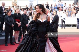 Nadine Nassib Njeim Instagram - I have always been fascinated by the glamour of the 50s era. The era of Brigitte Bardot and Sofia Loren.…
You know, I love how back then, women embraced their curves, fashion was bold, yet feminine… 

And here we are today… Zuhair and I decided to create a custom made dress inspired by this golden Era and this magical city… Cannes…
Thank you for every person who made this vision come to life…

Thank you @chopard for hosting me 🤍🖤