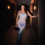 Nadine Njeim Instagram - « Be a mermaid. Swim fast wear a crown, and dream big. » A mermaid for #VogueBallofArabia 🧜‍♀️ Stylist: @cedrichaddad Dress: @ramikadi Jewelry: @bulgari Shoes: @aquazzura Bag: @tylerellisofficial Makeup: by Nadine njeim beauty Photo: @mk.visionn #nadinenassibnjeim #نادين_نسيب_نجيم