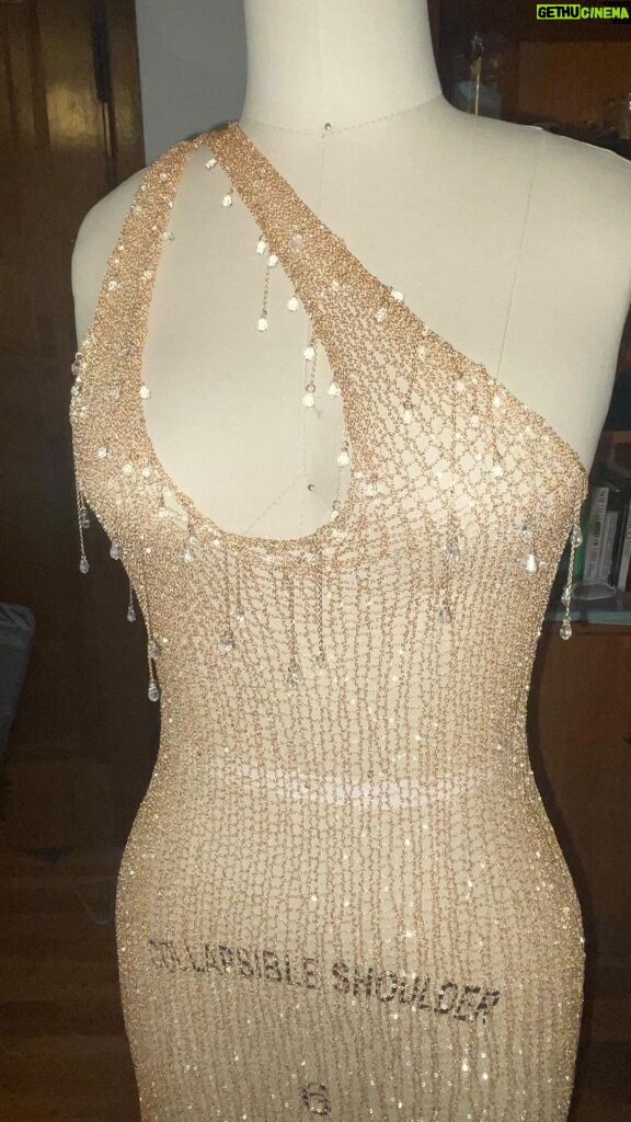 Natalia Fedner Instagram - So nice I had to post it twice. Custom gold gown with dripping @swarovski crystals - asymmetrical neckline and leg slit. #swarovski #wetlook #dripping #metalcouture #chainmail #chainmaille #gold