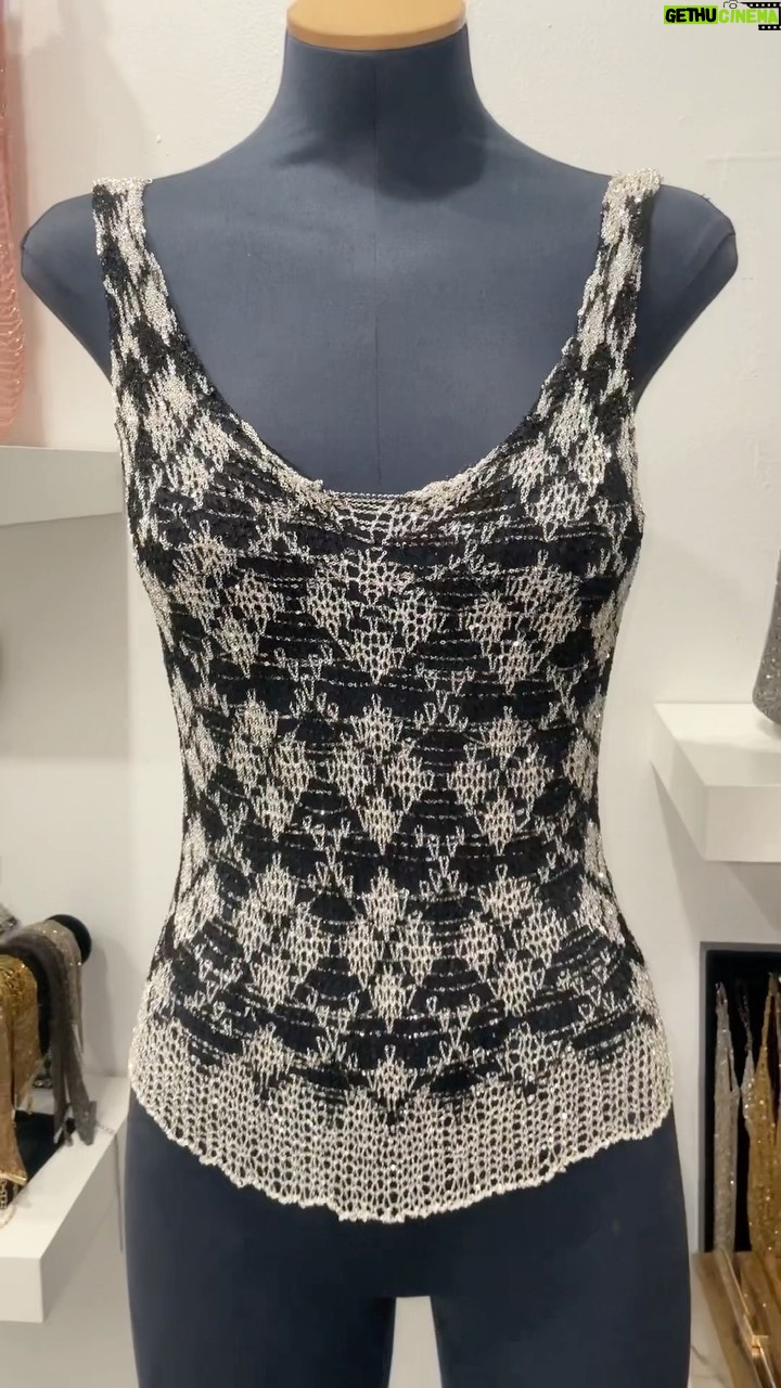Natalia Fedner Instagram - Yes it’s really metal. No it’s not a print. We can make any pattern into a metal design. This is a custom piece for @argyleandvalentine @thekathyrose - she asked for the argyle pattern. It takes about 3 days of math before any tool or piece of chain is actually picked up. To make patterns, we have to use a combination of graph paper and computer pixel work - and then we make swatches. Finally we combine the pattern with the overall desired shape of the garment (more math!) to make sure the pattern lines up beautifully at the neck, hem, and side seams. For us, Fashion design truly is art, craft, technology, and engineering. 👷♀️ #fashiondesign #argyle #argylepattern #textiledesign #metal #chainmail #chainmaille #stretchmetal Los Angeles, California