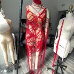 Natalia Fedner Instagram - She’s just so pretty 😍 @zerinaakers provided amazing creative direction on this fun project. She directed me to design and make a dress that looked like “capillaries and veins”. Since I love knitting and working with ribbons, I suggested using chiffon. I took deadstock silk chiffon, cut it into continuous ribbons, and knit those ribbons into panels. The panels were sewn together to create the illusion of “a capillary network”. And of course, @theestallion brought the very sustainable dress to life in a spectacular way. #sustainability #sustainablefashion #knitting #knitdress #reddress #megantheestallion #HISS #zerinaakers