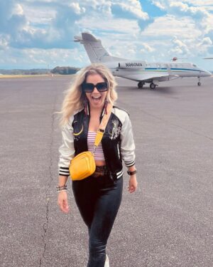 Natalie Stovall Instagram - 🏁 Bristol Baby!! 🏁 
When I was little, my big brother, Joe, would have his friends over every weekend for the @nascar races. And inevitably, when a break would happen, there was always a “Natalie! Go get your fiddle!” So I’d play a few songs and feel like the coolest kid around. 
Fast forward to this past weekend, I attended my very first race, in the “coolest kid” way possible… (thank you @quartzhillrecords 🤍🥂) and I found myself again playing that fiddle, as us ladies did a little acoustic set for some VIP’s. It was so much fun cheering for @tyler_reddick and getting to soak it all in! What an experience!!! Swipe to the end to see Joe-Bob and little me.