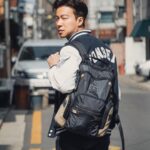 Nathaniel Ho Instagram - Whether I'm headed to school, my studio, or even exploring Seoul (and beyond), my Alpha Bravo Navigation Backpack from @tumitravel is the perfect companion. I love that this new range is rugged but light, and has a ton of compartments - definitely very utilitarian and practical. It's made with sustainable materials too! The backpack itself is stylishly compact, yet has an expandable zipper to accommodate extra items if needed. The bag straps are also broad and well-cushioned, making my commutes comfortable and enjoyable. I’m definitely looking forward to more adventures with my #TUMI ✈️ #TUMISG #UnpackTomorrow @wcommunications.sg Seoul, Korea