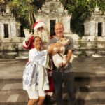 Nia Dinata Instagram - Christmast at the Temple..with Javanese Santa❤️💚 and Quarantini is a bit affraid of mbah Santa🙏🏼🌲sending love from Jogja to all over😇🙏🏼 #christmas2023 #loveandlight #mbahsanta #niamaste Candi Tirto Raharjo