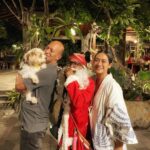 Nia Dinata Instagram - Christmast at the Temple..with Javanese Santa❤️💚 and Quarantini is a bit affraid of mbah Santa🙏🏼🌲sending love from Jogja to all over😇🙏🏼 #christmas2023 #loveandlight #mbahsanta #niamaste Candi Tirto Raharjo