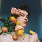 Nicholas Galitzine Instagram - So long as you’re home by Midnight✨ I had such a magical time taking photos with @flauntmagazine for their ‘In the Garden’ issue, which is live on their website now. It might be the wild, nature boy inside me, but I felt so at home being adorned in flowers and having a laugh. 📸 @jasonhetheringtonstudio 🖌 @liztaw 👕 @millermode