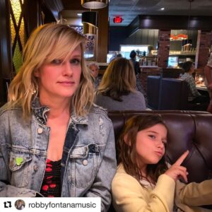 Nicholle Tom Instagram - I get a real kick out of this one! Seriously she practices her ninja kicks on me all the time!;) #LoveHer #LoveUs #Ouch #HiiYa