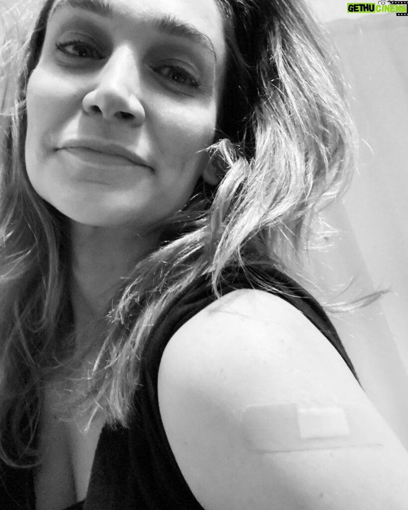 Nicole da Silva Instagram - Vaxxed To the Max 💪🏼💉😎 This is for the healthcare and frontline workers, my nearest and dearest and the vulnerable in our communities • Thanks, Science • Looking forward to the 5G kicking in📡 Image Description: A black and white photo shows a woman with a bandaid on her upper arm. Gadigal Country