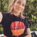 Nicole da Silva Instagram – FOLLOW UP TO MY LAST POST:
Or, buy YOURSELF a gift with meaning👇🏼
1. An #ULURUSTATEMENT from the Heart Tee. Raise awareness to have a First Nations Voice to Parliament @ulurustatement @theiconicau 💛🖤❤️
2. Get yo’self a killer @frankgreen_official #AlwaysWasAlwaysWillBe Reusable Water Bottle from one of my faves @clothingthegaps 🌏 👊🏼
3. Or some very cool @havaianas.australia thongs/flip flops designed by the ever-excellent @lukejohnmatthewarnold which will raise funds for the Port Macquarie Koala Hospital 🐨 🌳
Let’s use our 💰 for the common good 😊
ID: 1st photo Nicole wears a TShirt that says “We Support The Uluru Statement”. 2nd photo is Nicole pulling a funny face with a reusable water bottle that says “Always Was”. 3rd, is a video of a box opening with a pair of colourful thongs/flip flops inside.