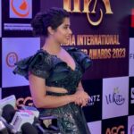 Nikita Sharma Instagram - A special night indeed. ♥️ Won the award for “Inspirational Icon of the Year” 2023 🏆✨ This moment was made so much more special by having my parents with me to celebrate it! 🥰 A huge thank you to you all for always believing in me. 🙏🏻 Gown by @amadicoutureofficial Makeup & Hair by @makeupbyemmarai #grateful #humbled #thankful #blessed Mumbai, Maharashtra