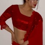 Nikita Sharma Instagram - Resplendent red amalgamating with glitter, here is Navratri look 7 for you all 🌹✨ This one is from @samyakksarees ♥️ #feelitreelit #explore #feature #red #saree #love #navratri #navratriseries #look #festive #festiveseason