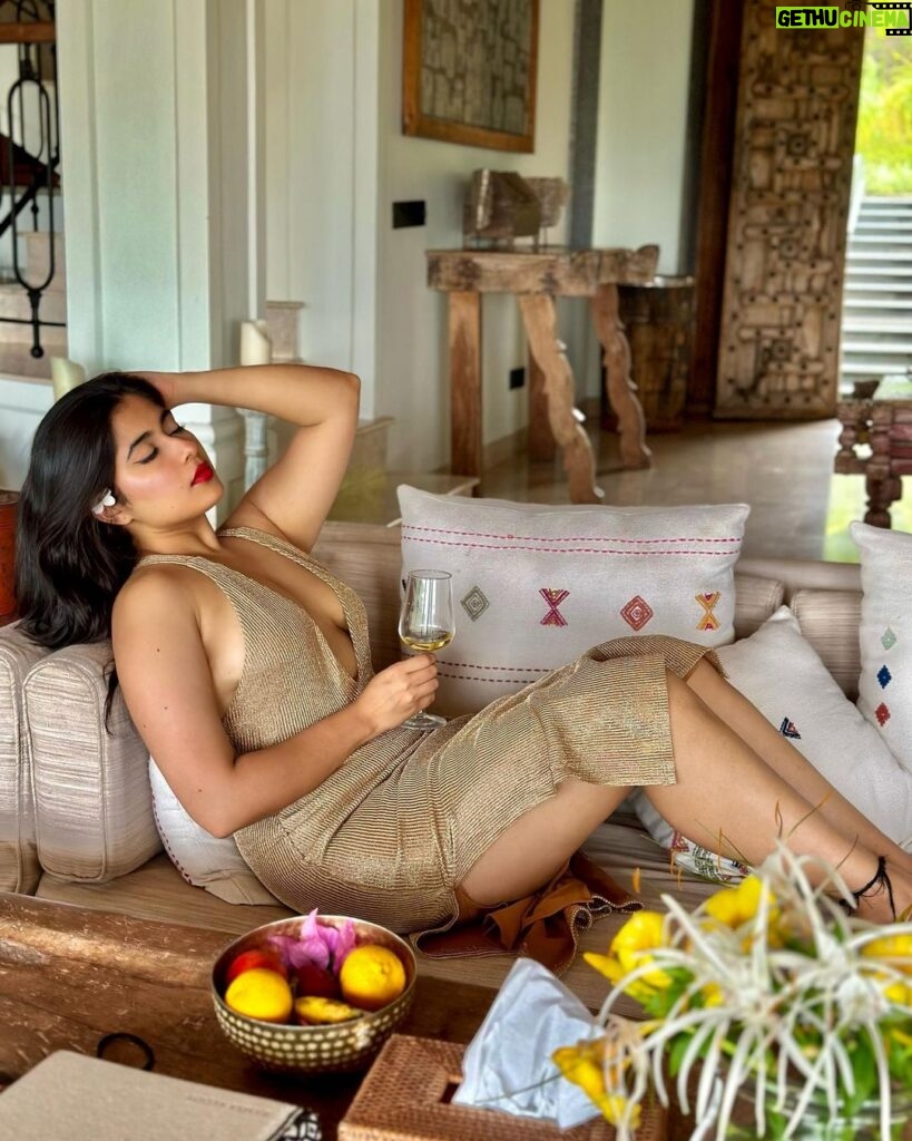 Nikita Sharma Instagram - Red lips and a golden dress. The perfect Leo attire. ♥️✨ Luxury resort in the middle of a thick jungle. The perfect Leo getaway. 🍃 Wine in a glass with spaghetti cooked to perfection. The perfect Leo food. 🍝