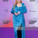 Nikkie de Jager Instagram - about last night 🪐 I had so much fun hosting the @aboutyouawards ✨ congratulations to all the winners! even though I was the official host of the evening, I felt like a winner in this killer outfit! 👏🏻 custom made by @marjabennenbroek