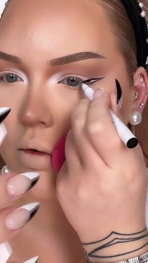Nikkie de Jager Instagram - this winged liner hack changes EVERYTHING 🤯🥵✨ @katiejanehughes you’re a genius!
