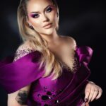 Nikkie de Jager Instagram - a fairytale dress for the grand finale @eurovision 💘 thank you for making me feel like a princess @edwin_oudshoorn ✨ wearing the trans flag on my heart for this special night! 🤍 Styling @marjabennenbroek Hair @mandynijland Nails @electanailart Art-direction @diekidiek Photography @chrisphilippo