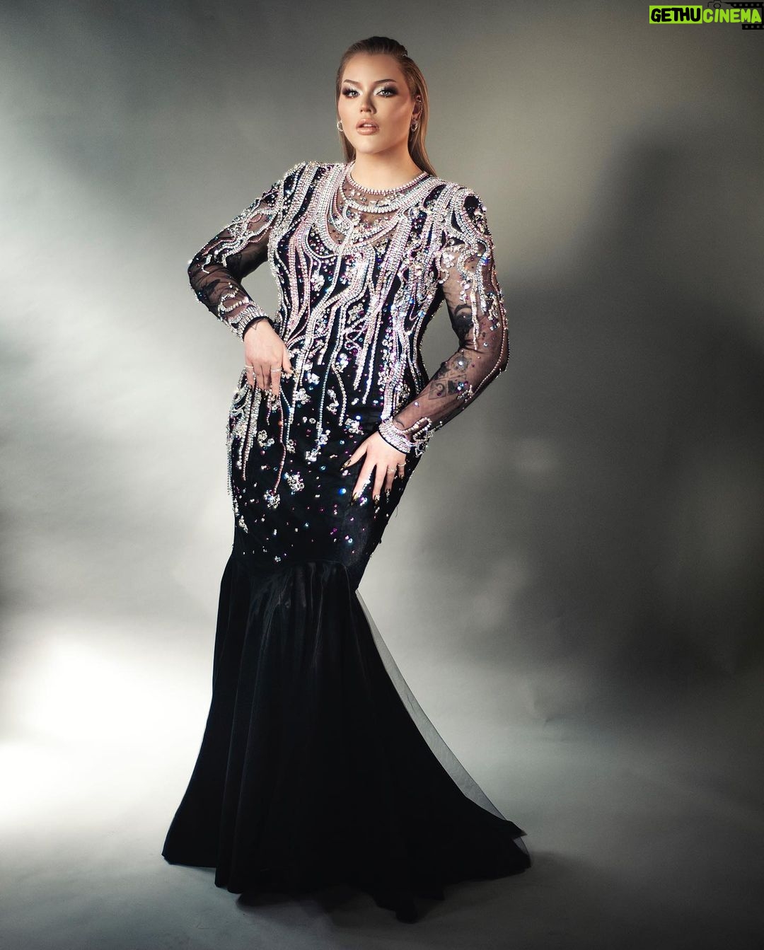 Nikkie de Jager Instagram - it is my honor to represent the trans flag colors in my gown for tomorrow’s second semi-finals @eurovision 🏳️⚧️✨ thank you @maisonthefaux for this dream! 🤍 Styling @marjabennenbroek Hair @mandynijland Art-direction @diekidiek Photography @chrisphilippo