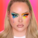 Nikkie de Jager Instagram - PRIDE, BABY! 🌈✨ asked you guys to send in YOUR Pride looks and I’m here recreating one of them! original by @jayperpalma 😍 I used: - @juviasplace I Am Magic Foundation ( use code NIKKIE to save $$ ) @acebeaute Slice of Paradise Eyeshadow Palette @glowup_academy “Ice Me Out” Glitter @ofracosmetics “Space Baby” Highlighter ( I created this gorgeousness 😇 ) @kyliecosmetics “Girls Trip” Lip Pencil @suvabeauty Hydra FX for the tears
