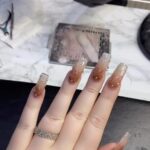 Nikkie de Jager Instagram - this is my first pride month finally being out and welcomed into the rainbow family 🌈💖✨ decided to celebrate with some pride nails 💅🏻 thank you @electanailart