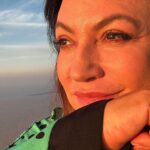 Norah Casey Instagram – I loved it 😊 we were almost gliding across the dessert as the sun rose in the sky – no wind, just serene and ethereal … apart from the big blasts from the fire keeping us up with Orlando our pilot, like a conductor, manoeuvring the ropes and releasing the flames, we spotted camels striding across the sand in the early morning and gazed out at our fellow ballooners – all in all a magical experience 🙏💚 @balloonadventures_dubai #beyourownhero❤️