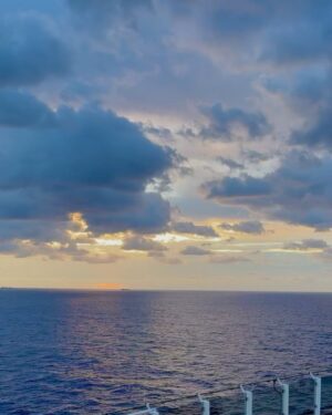Norah Casey Instagram - I try never to miss a sunrise and this one at 6.40 over the ocean was beautiful … I was the only eejit on the top deck waiting for that little orange spark… it’s cloudy and I’ve seen more spectacular sunrises… but the one right in front of you is always the perfect sunrise, for that moment and that brand new day. Thankful as ever that I have a whole day of adventure ahead on the @norwegian__viva #inaugralsailing … full review @womansway and my new magazine #planetwomantravel