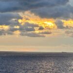 Norah Casey Instagram - I try never to miss a sunrise and this one at 6.40 over the ocean was beautiful … I was the only eejit on the top deck waiting for that little orange spark… it’s cloudy and I’ve seen more spectacular sunrises… but the one right in front of you is always the perfect sunrise, for that moment and that brand new day. Thankful as ever that I have a whole day of adventure ahead on the @norwegian__viva #inaugralsailing … full review @womansway and my new magazine #planetwomantravel