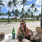 Norah Casey Instagram - South Beach… a little slice of life - and they’ve upgraded the goldfish bowl cocktails to mahoosive mugs 😂 no sugar #mohijto treat for me soaking up the sunshine and the amazing people watching … always with a little side of insulin (maybe a big one after all that travelling and the sun.. you know what it does 😅) #happydays #southbeachmiami #itslifebutnotasweknowit ☀️