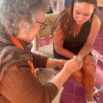 Norah Casey Instagram - As the temperature hit 25 degrees we headed up to the village of Sarnadas in the parish of Alte and a little weaving workshop, Casa do Esparto, based in the repurposed Escola Primária das Sarnadas. It’s one of a network of artisan spaces of the Loulé Criativo project which is revitalising ancient creative traditions in the region. There I met this wonderful woman Donna Aldegundes Gomes, born in the village, she proudly tells me she’s 89 years old and 60 years a weaver. She has a big heart, skilful hands and a wide smile. You can tell she loves what she does. Now she is passing on her knowledge to new generations and enthusiastic amateurs like me. She and the other women in the collective use Esparto grass which grows wild in this area - the Barrocal lands of the Algarve interior. Essential back in the day for carpets, rugs, baskets and much more, the women are bringing back the traditional method and weaving patterns to create lovely unique pieces, some decorative, many practical. I was in the baby class making key rings which was a lovely hands-on, gentle and calming experience. Hands touching hands, heads bent close together nudging the grasses into new shapes and patterns. #creativityinaction @loule_criativo @visitalgarve