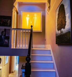 Norah Casey Instagram - WE ARE STARDUST...
In my house I have a light installation by artist Oisin Byrne called “we are stardust”. It’s a magical recreation of two people intertwined in starlight and it has always lived at the top of the stairs leading to our bedroom. Richard had cancer in most of his major organs but it was the cancer in his spine that was the most debilitating. And as it became harder and harder for him to climb those stairs he would stare at that installation as he paused to catch his breath and gather his strength to take another step. Some evenings we remained there for 30 minutes or more as he steadfastly made his way purposefully up those stairs – refusing all offers of help. Most of these journeys would begin with Dara and myself encouraging him, distracting him. Dara would try to tell him something funny - trying to find normality in the tragic circumstances that led to his wonderful strong dad making that painful journey. Sometimes we ran out of words. It was during one of those long moments of silence that Richard paused and said “I believe in star dust” – it was a phrase that he repeated often after that – a sort of mantra that gave him the grit to see through those terrible days – a comfort that he would re-join the cosmos from whence he came. 
The light installation was so important to him. Yet if you analyse it – decompose it - what it amounts to is a light shining through pinpricks on paper. But the key is the light – the illumination. Because stars are only a vast collection of matter. It is only the tumultuous reactions of that spinning and thumping and heaving that releases the energy and creates the light that shines so brightly we can see it here on earth. 
Sending a million hugs to all who live with and beyond cancer and those, like me, who miss the stars we have lost that shone brightly in our lives. The stardust that makes up our universe #worldcancerday