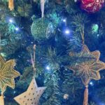 Norah Casey Instagram - Of course as we go through life Christmas also reminds us of absences, the family and loved ones we miss, those who have gone and those who can’t be with us. Like many people I have certainly been through difficult Christmases and it takes time to rediscover the wonderfulness. And I’m always late putting up the tree… but I get there eventually 😅 When I was growing up the tree didn’t go up until Christmas week. It was all about the excitement and anticipation. And thankfully the pre-Christmas flutters were mercifully short, starting when the school bell signalled the start of the holidays and we raced home to help put up the tree, just days before the big day. My dad brought down the biscuit tin filled with tinsel and home made decorations by the Casey kids. It also held a very important list… and it wasn’t Santy’s! My dad #harrycasey wrote down the price of the pint every Christmas and he ceremoniously filled in the cost bemoaning the tragedy of Guinness inflation while we fought over who would place the star on the top of the tree. Mostly our home was filled with holly and fir from the Phoenix Park and we had our own reindeer waiting patiently on those frosty days for Santy to collect them on Christmas Eve. What could be more magical. I like reusing those lovely treasured pieces from over the years that remind me of Dara’s first Christmas, the trip to London when myself and a great friend bought some (far too high-priced) baubles in Harrods, the now very chipped, but rich with memories, crib and bits and bobs that we collected on holidays. I take them all up from the basement and mix them up a bit so every year the house looks different. Last year I splashed out on some green tree decorations to mix in with the mainly white and gold that I have collected for decades. It is always beautiful to me and yours will be the same, however you choose to transform your home for the festive season… Christmas Trees are #memorytrees🎄 💚