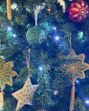 Norah Casey Instagram - Of course as we go through life Christmas also reminds us of absences, the family and loved ones we miss, those who have gone and those who can’t be with us. Like many people I have certainly been through difficult Christmases and it takes time to rediscover the wonderfulness. 
And I’m always late putting up the tree… but I get there eventually 😅
When I was growing up the tree didn’t go up until Christmas week. 
It was all about the excitement and anticipation. And thankfully the pre-Christmas flutters were mercifully short, starting when the school bell signalled the start of the holidays and we raced home to help put up the tree, just days before the big day. My dad brought down the biscuit tin filled with tinsel and home made decorations by the Casey kids. It also held a very important list… and it wasn’t Santy’s! My dad #harrycasey wrote down the price of the pint every Christmas and he ceremoniously filled in the cost bemoaning the tragedy of Guinness inflation while we fought over who would place the star on the top of the tree. Mostly our home was filled with holly and fir from the Phoenix Park and we had our own reindeer waiting patiently on those frosty days for Santy to collect them on Christmas Eve. What could be more magical. 
I like reusing those lovely treasured pieces from over the years that remind me of Dara’s first Christmas, the trip to London when myself and a great friend bought some (far too high-priced) baubles in Harrods, the now very chipped, but rich with memories, crib and bits and bobs that we collected on holidays. I take them all up from the basement and mix them up a bit so every year the house looks different. Last year I splashed out on some green tree decorations to mix in with the mainly white and gold that I have collected for decades. It is always beautiful to me and yours will be the same, however you choose to transform your home for the festive season… Christmas Trees are #memorytrees🎄 💚