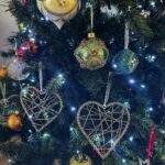 Norah Casey Instagram - Of course as we go through life Christmas also reminds us of absences, the family and loved ones we miss, those who have gone and those who can’t be with us. Like many people I have certainly been through difficult Christmases and it takes time to rediscover the wonderfulness. And I’m always late putting up the tree… but I get there eventually 😅 When I was growing up the tree didn’t go up until Christmas week. It was all about the excitement and anticipation. And thankfully the pre-Christmas flutters were mercifully short, starting when the school bell signalled the start of the holidays and we raced home to help put up the tree, just days before the big day. My dad brought down the biscuit tin filled with tinsel and home made decorations by the Casey kids. It also held a very important list… and it wasn’t Santy’s! My dad #harrycasey wrote down the price of the pint every Christmas and he ceremoniously filled in the cost bemoaning the tragedy of Guinness inflation while we fought over who would place the star on the top of the tree. Mostly our home was filled with holly and fir from the Phoenix Park and we had our own reindeer waiting patiently on those frosty days for Santy to collect them on Christmas Eve. What could be more magical. I like reusing those lovely treasured pieces from over the years that remind me of Dara’s first Christmas, the trip to London when myself and a great friend bought some (far too high-priced) baubles in Harrods, the now very chipped, but rich with memories, crib and bits and bobs that we collected on holidays. I take them all up from the basement and mix them up a bit so every year the house looks different. Last year I splashed out on some green tree decorations to mix in with the mainly white and gold that I have collected for decades. It is always beautiful to me and yours will be the same, however you choose to transform your home for the festive season… Christmas Trees are #memorytrees🎄 💚