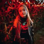 Olive Elise Abercrombie Instagram – Stretchy face pumpkin sweater bringing extra horror to the haunted corn maze this year. 🎃 🔪 Uncle Shucks Corn Maze and Pumpkin Patch