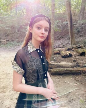 Olive Elise Abercrombie Instagram - Wedding attire from a few weeks back 🖤🤍 Amazing vintage dress from @trunkofdresses 🚲