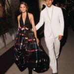 Olivia Palermo Instagram - His & Hers Armani 👩🏼‍❤️‍👨🏻 In vintage @giorgioarmani Privé Spring 2013 and new @stuartweitzman boots for #GAonenightonlyVenezia 👗👢 💄: @sam_tsan for @charlottetilbury 💇🏼‍♀️: @marcoromanohairartist Venice, Italy