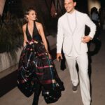 Olivia Palermo Instagram - His & Hers Armani 👩🏼‍❤️‍👨🏻 In vintage @giorgioarmani Privé Spring 2013 and new @stuartweitzman boots for #GAonenightonlyVenezia 👗👢 💄: @sam_tsan for @charlottetilbury 💇🏼‍♀️: @marcoromanohairartist Venice, Italy