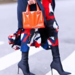 Olivia Palermo Instagram - Vroom vroom 🏎️💨 Red hot with the new @ferraristyle mini bag 👜 #adv #ferraristyle New York, New York
